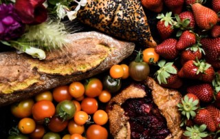 Fresh strawberries, tomatoes, flowers and baked goods from the mid-city farmers market