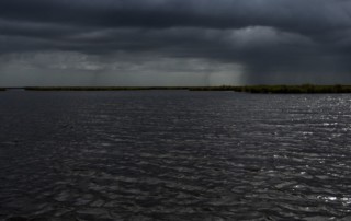 A distant storm as seen from a Hobie kayak