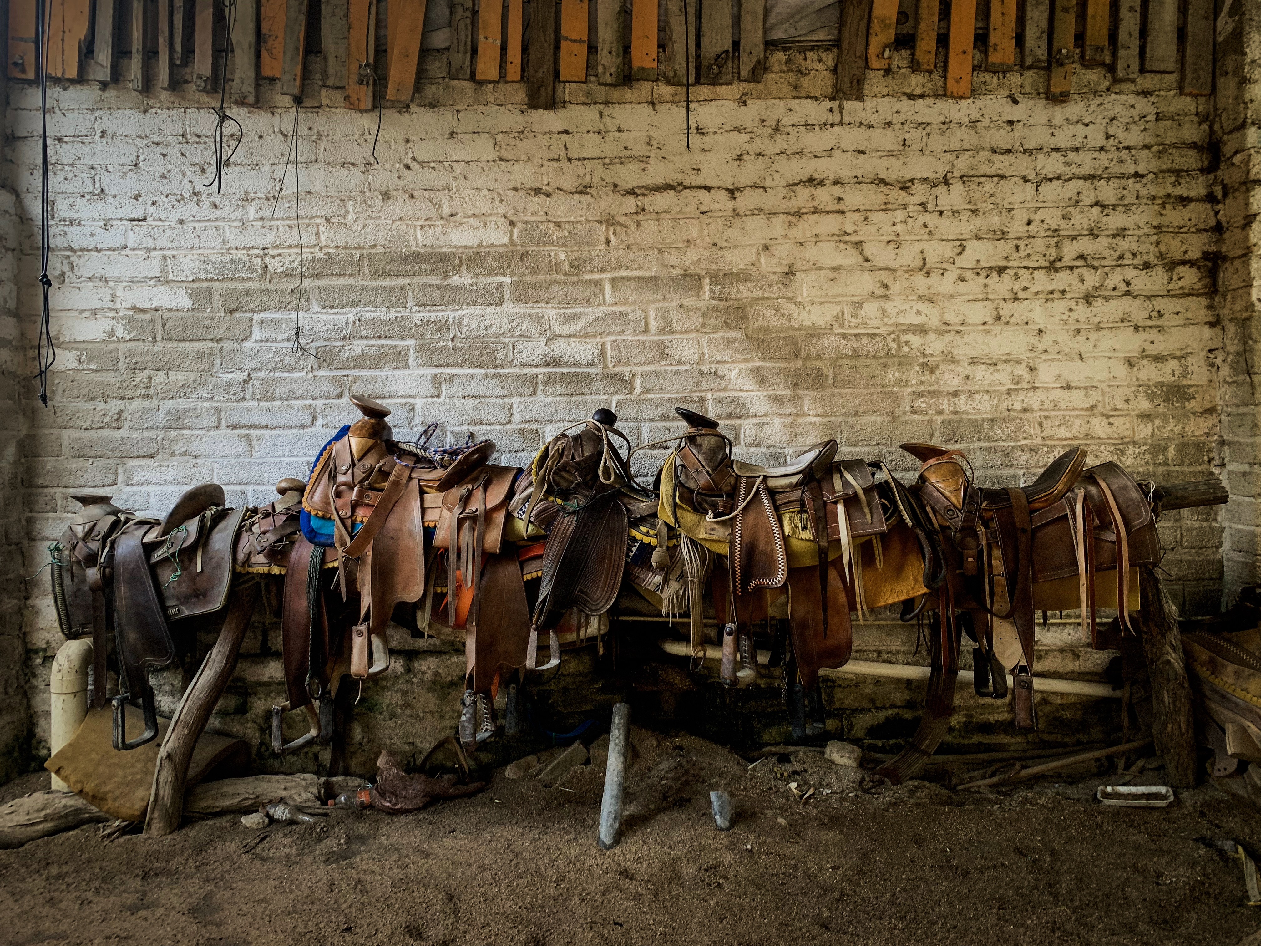 Saddles in a stable in the village of Yelapa