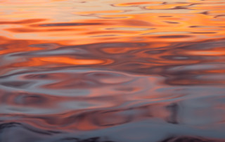Sunrise water reflections in Leeville, Louisiana