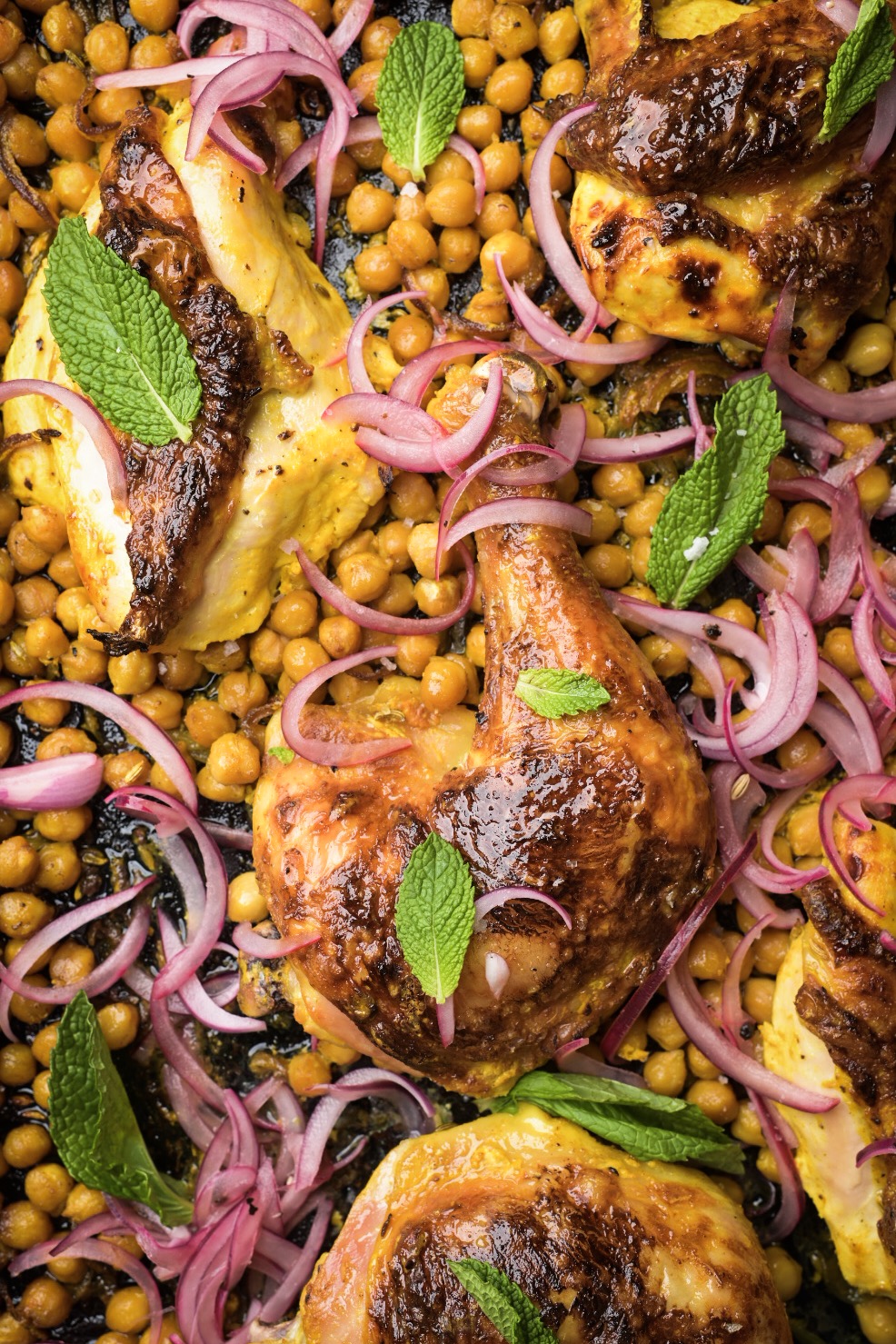 Roasted chicken with turmeric and Greek yogurt, chickpeas, pickled onions and fresh mint