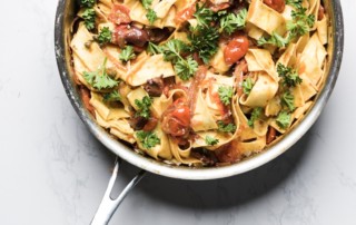 Pappardelle with harissa, olives, capers and tomatoes