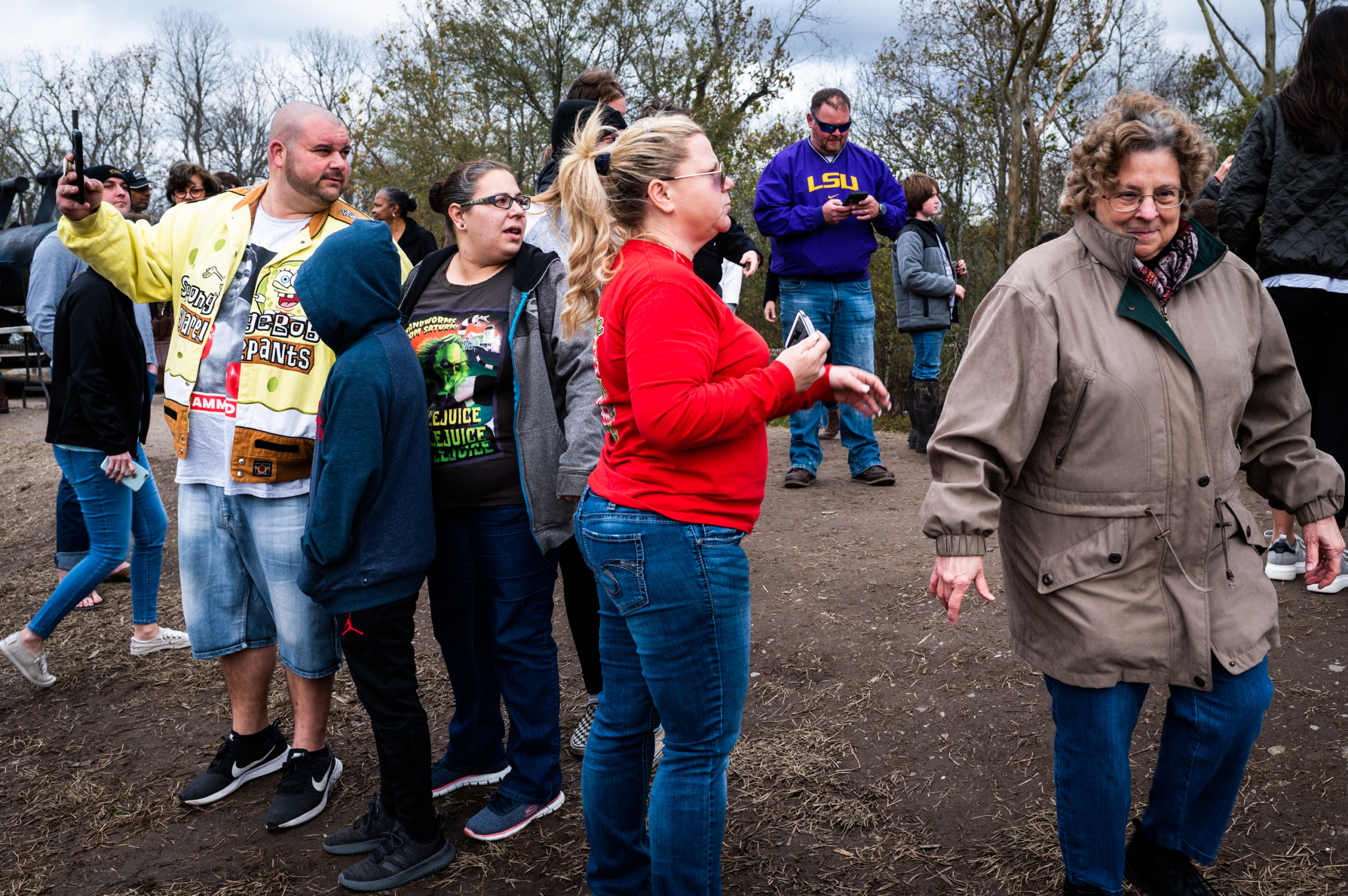 Crowds gathered on the levee in front of the 78-foot alligator sculpture