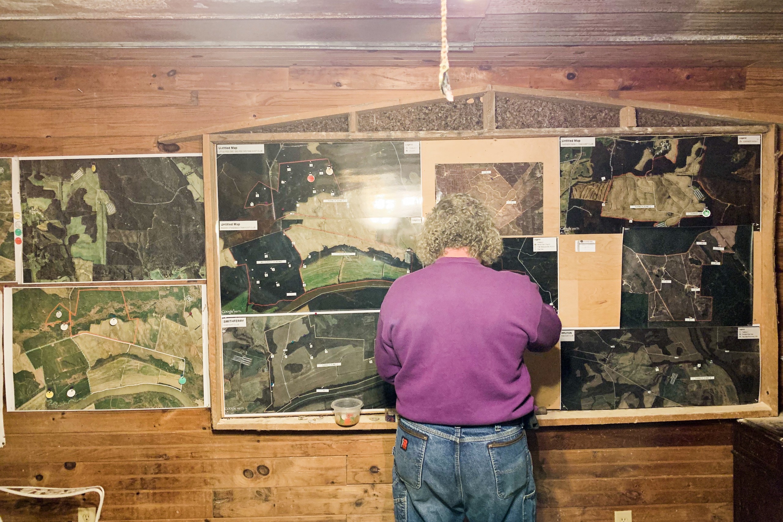 My dad selecting our hunt locations on maps of properties the club leases