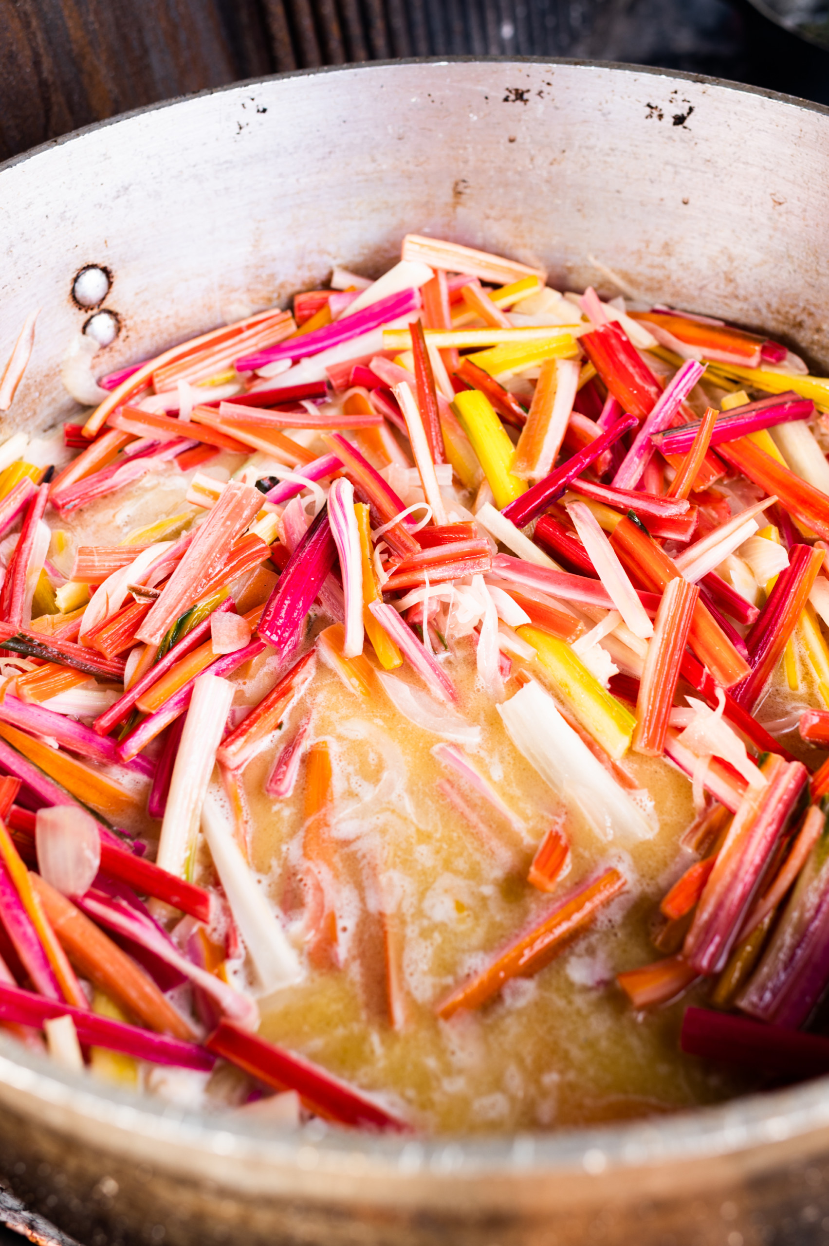 Swiss chard simmering over open fire at Ironbound Farms