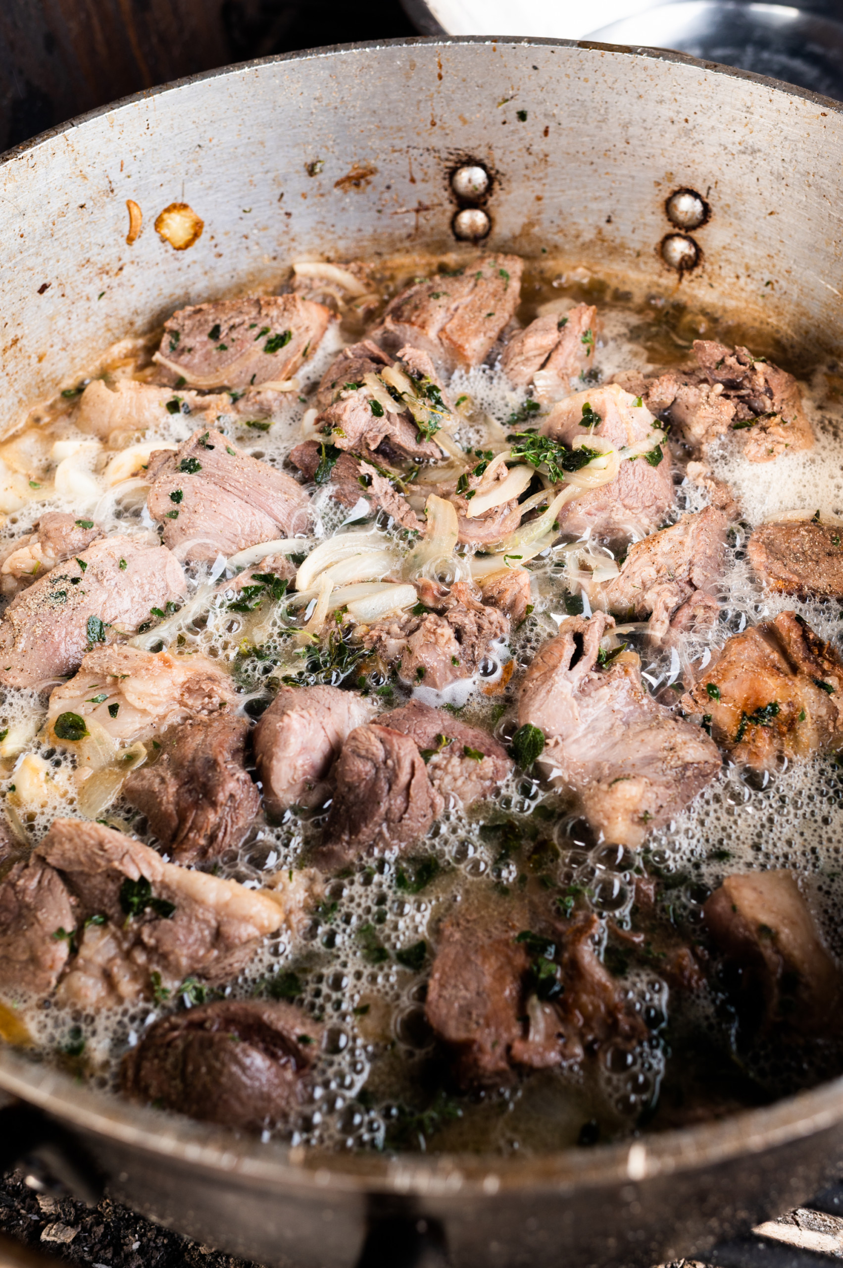 Venison simmering for a game meat and seafood curry at SquirrelFest 2019