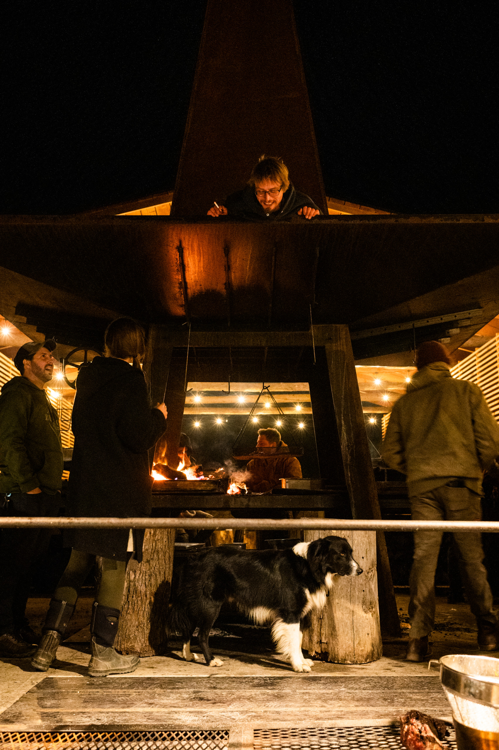 The cooking crew gathered around (and on top of) Ironbound Farms's Mother Fire