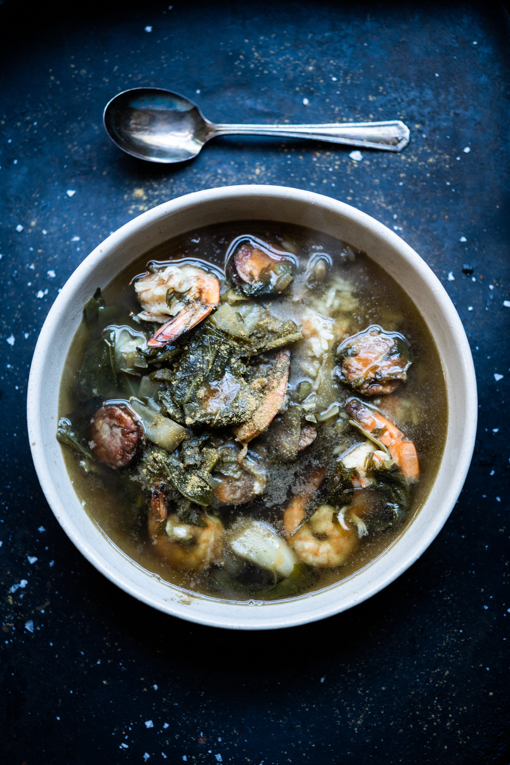 Gumbo z'herbes with a mix of greens, smoked duck sausage, and Louisiana shrimp