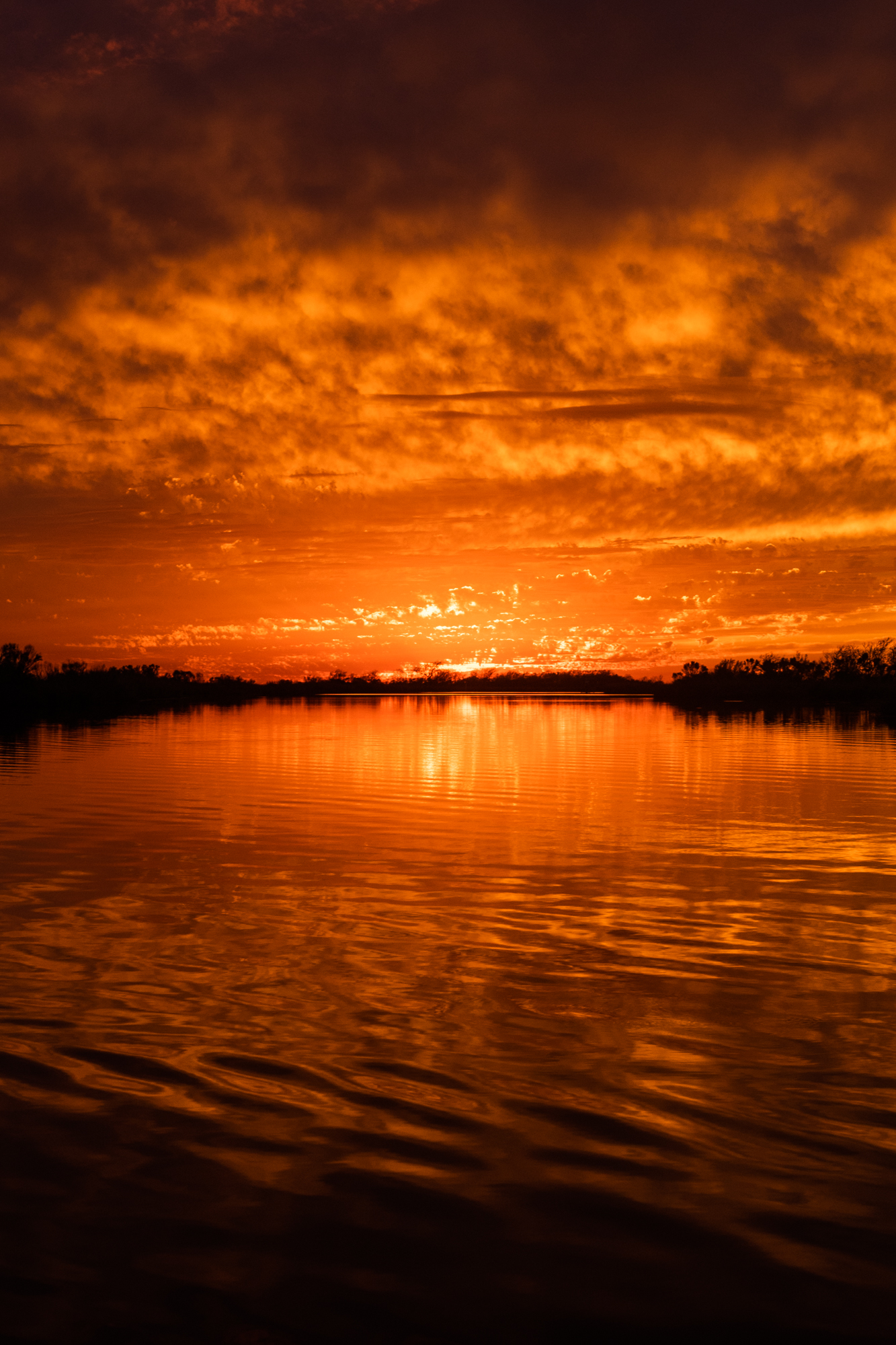 Sunset from an industrial canal in Golden Meadow