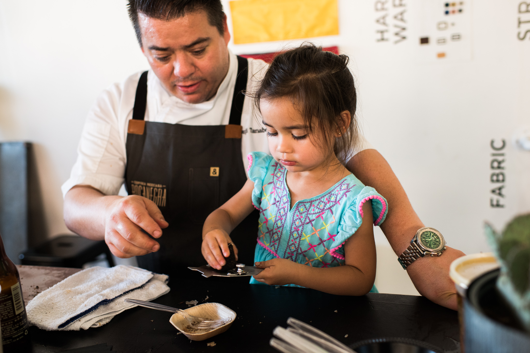 A local chef gets help slicing truffles from his daughter