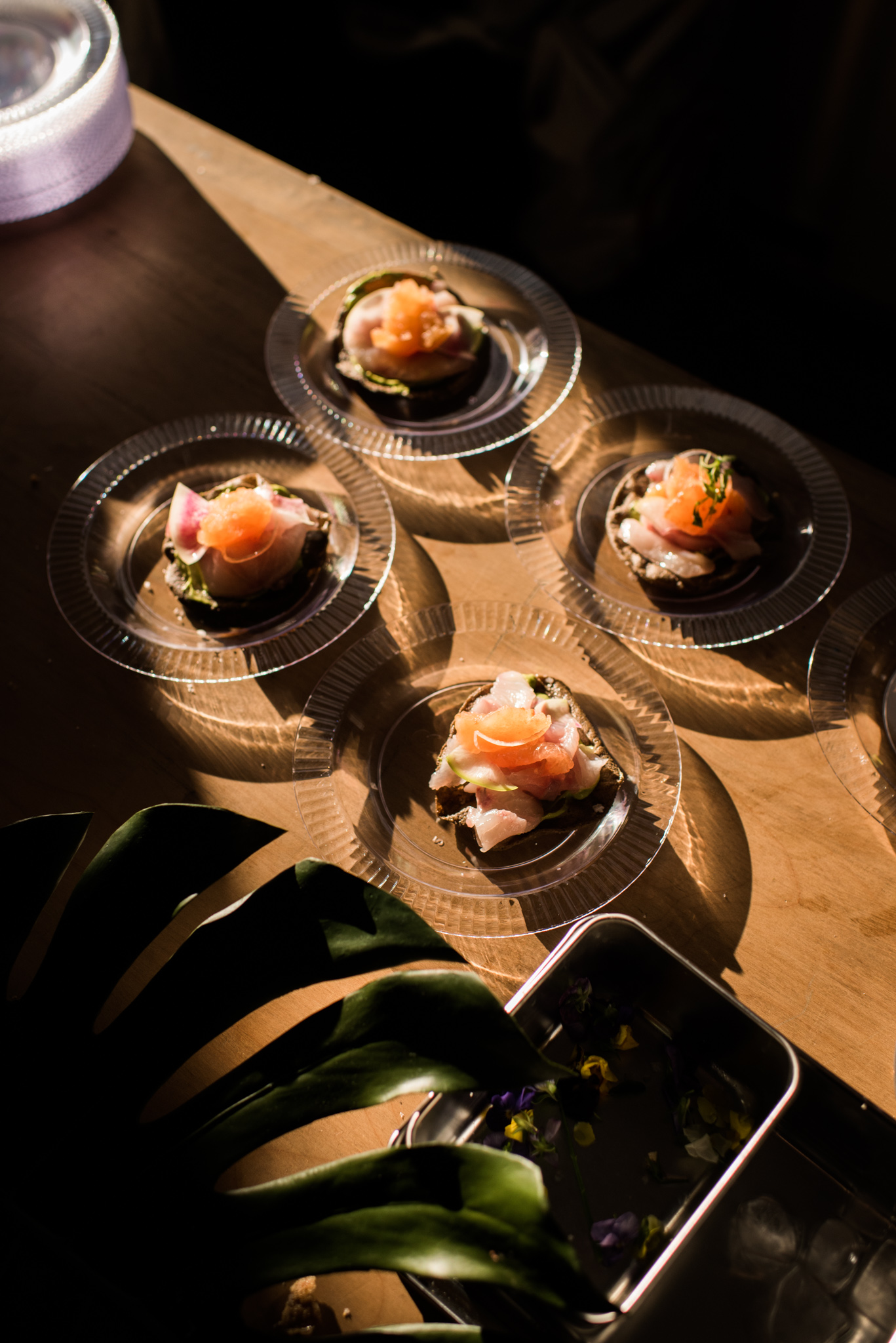 A signature dish is plated for the event