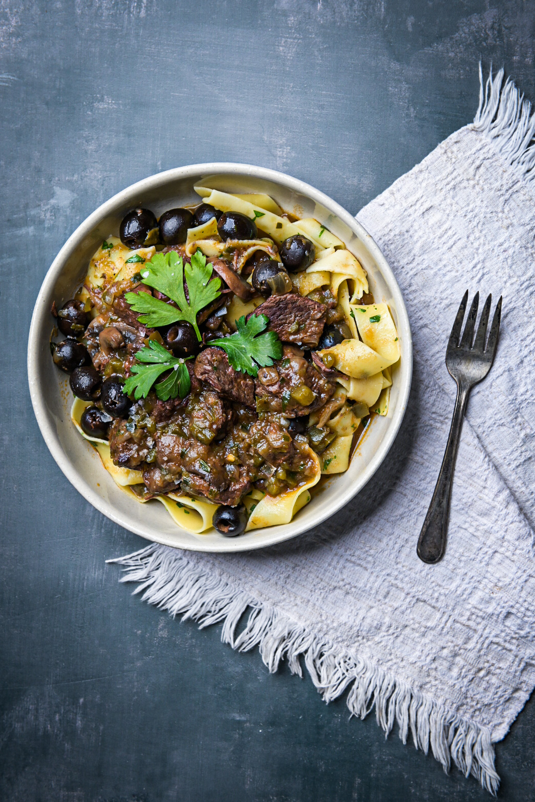 Buttered pappardelle with stewed beef and mushrooms