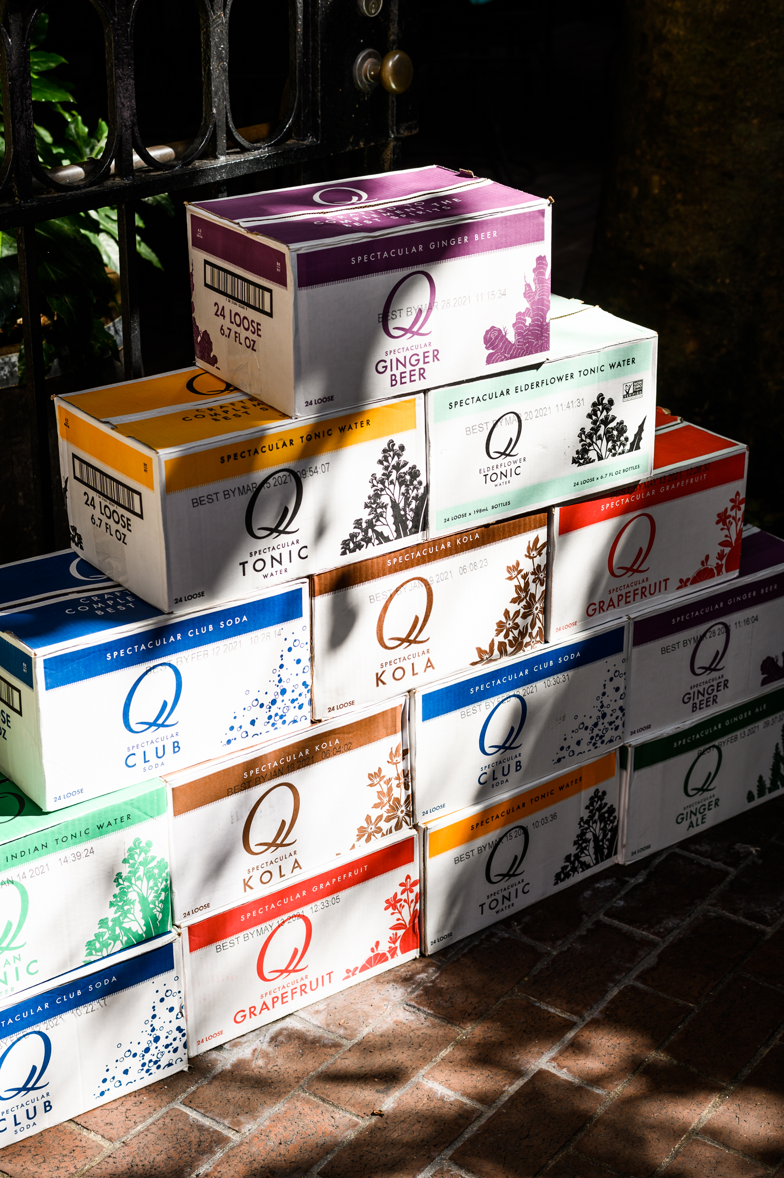 Cases of Q Mixers stacked in front of the Highball Hideout in the French Quarter
