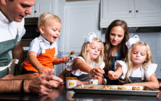 The Ricchiuti family making almond butter thumbprint cookies