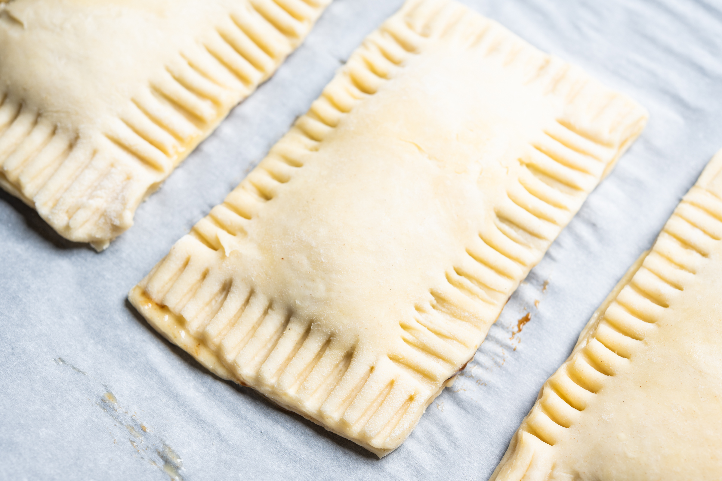 Crimped pastry edges, ready for baking
