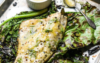 Grilled redfish with charred collards and dill