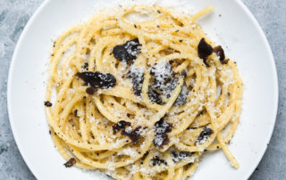 Cacio e pepe with bucatini and shaved black truffles