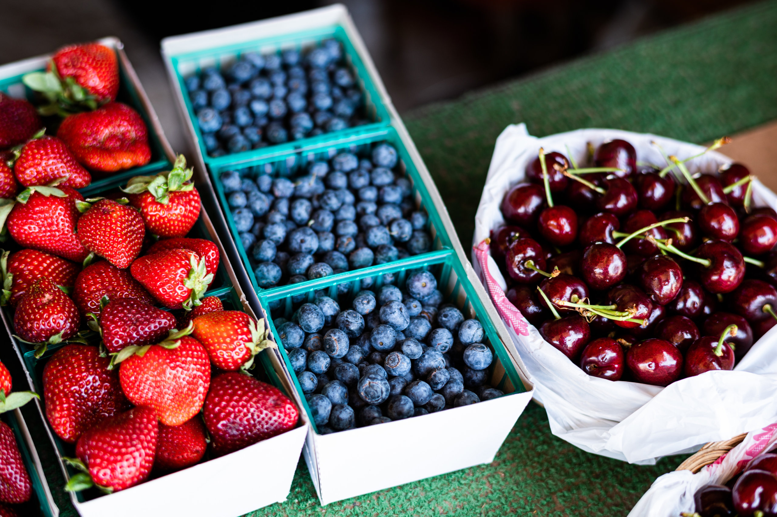 Fresh strawberries, blueberries and cherries grown in Madera, California