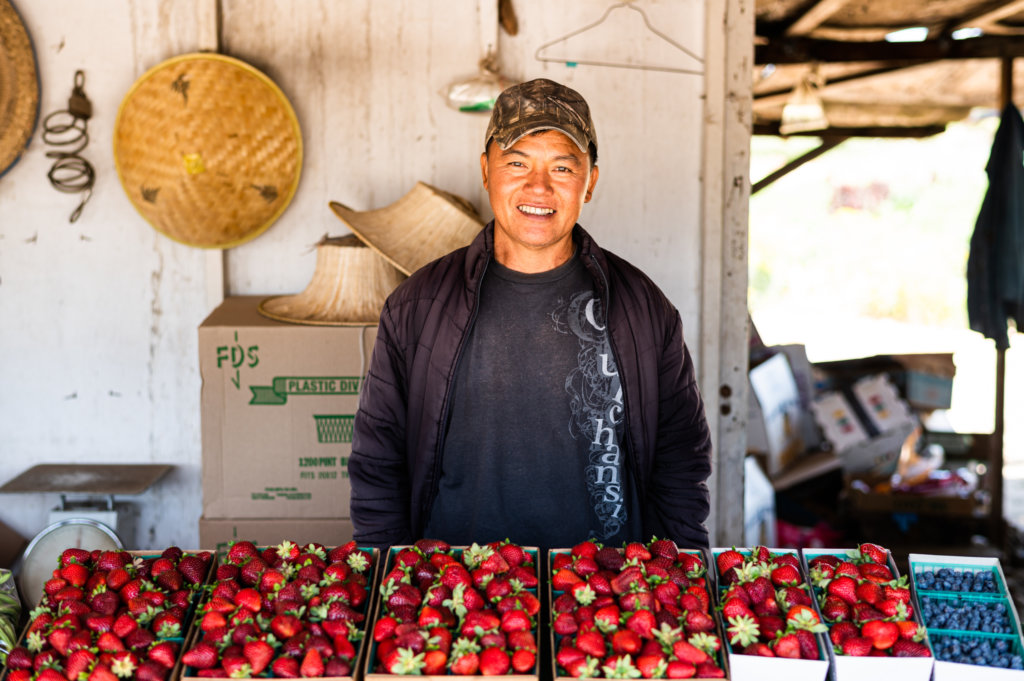 Portrait of a farmer in a roadside stand in Madera, California