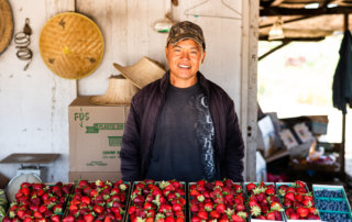 Portrait of a farmer in a roadside stand in Madera, California