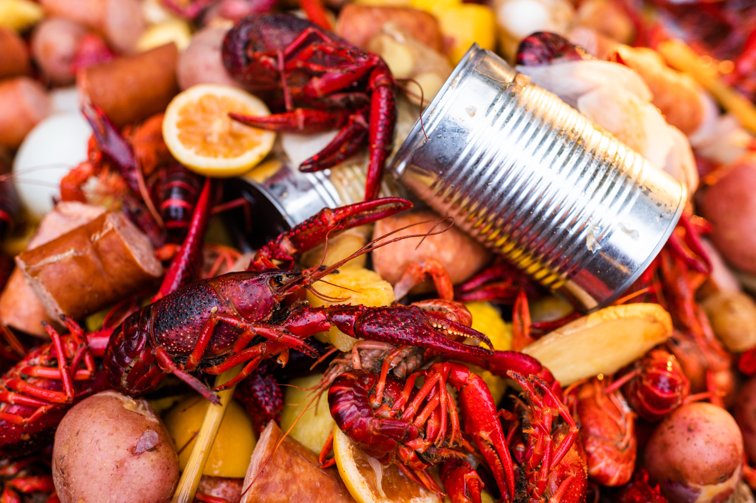 A pile of boiled crawfish with fixins