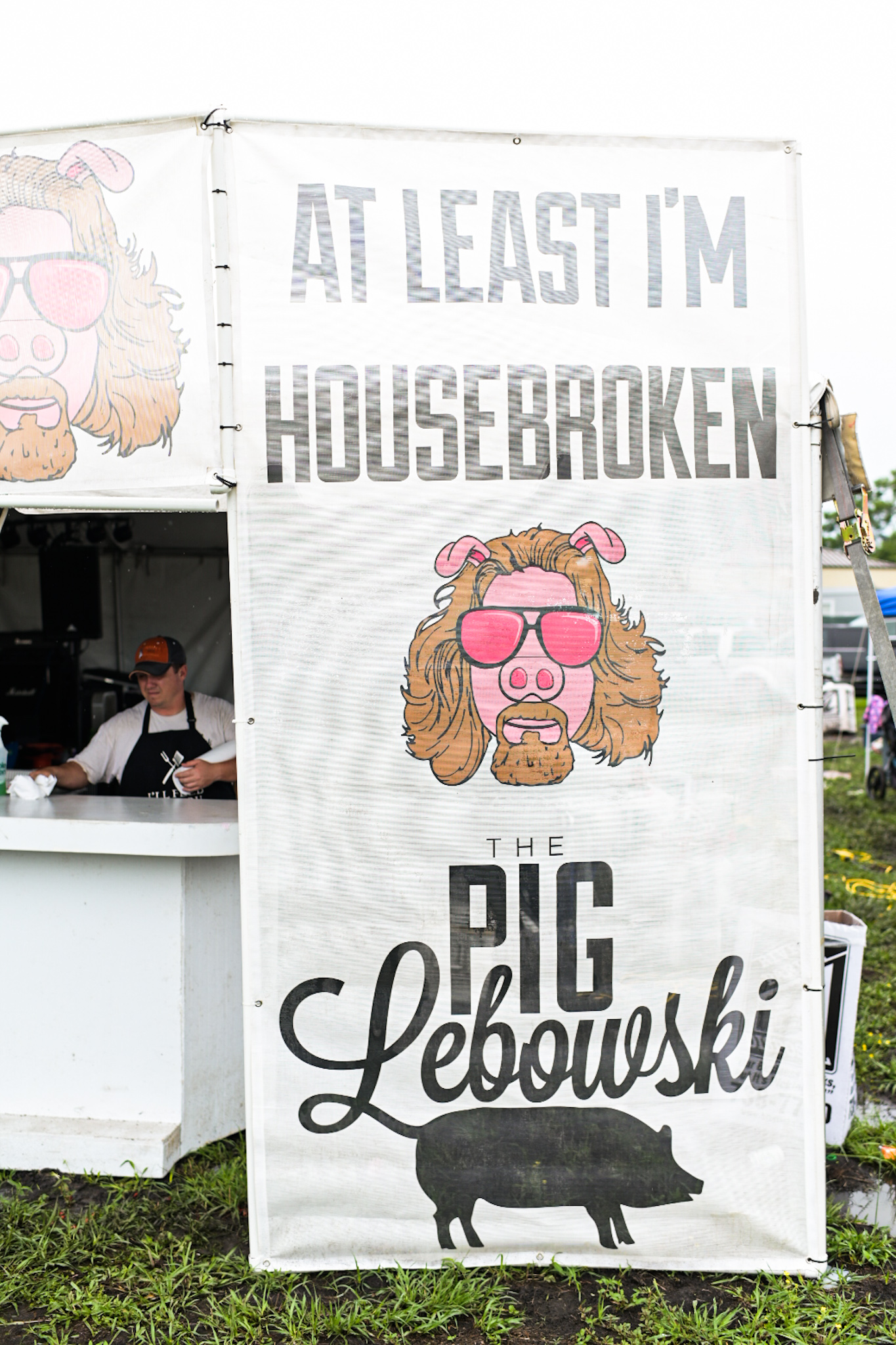 A sign from a competitor's booth - The Pig Lebowski