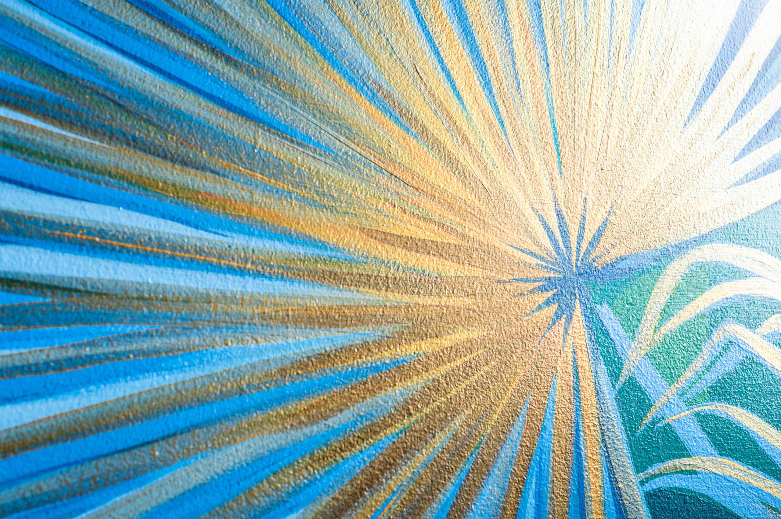Details of an iridescent palm frond