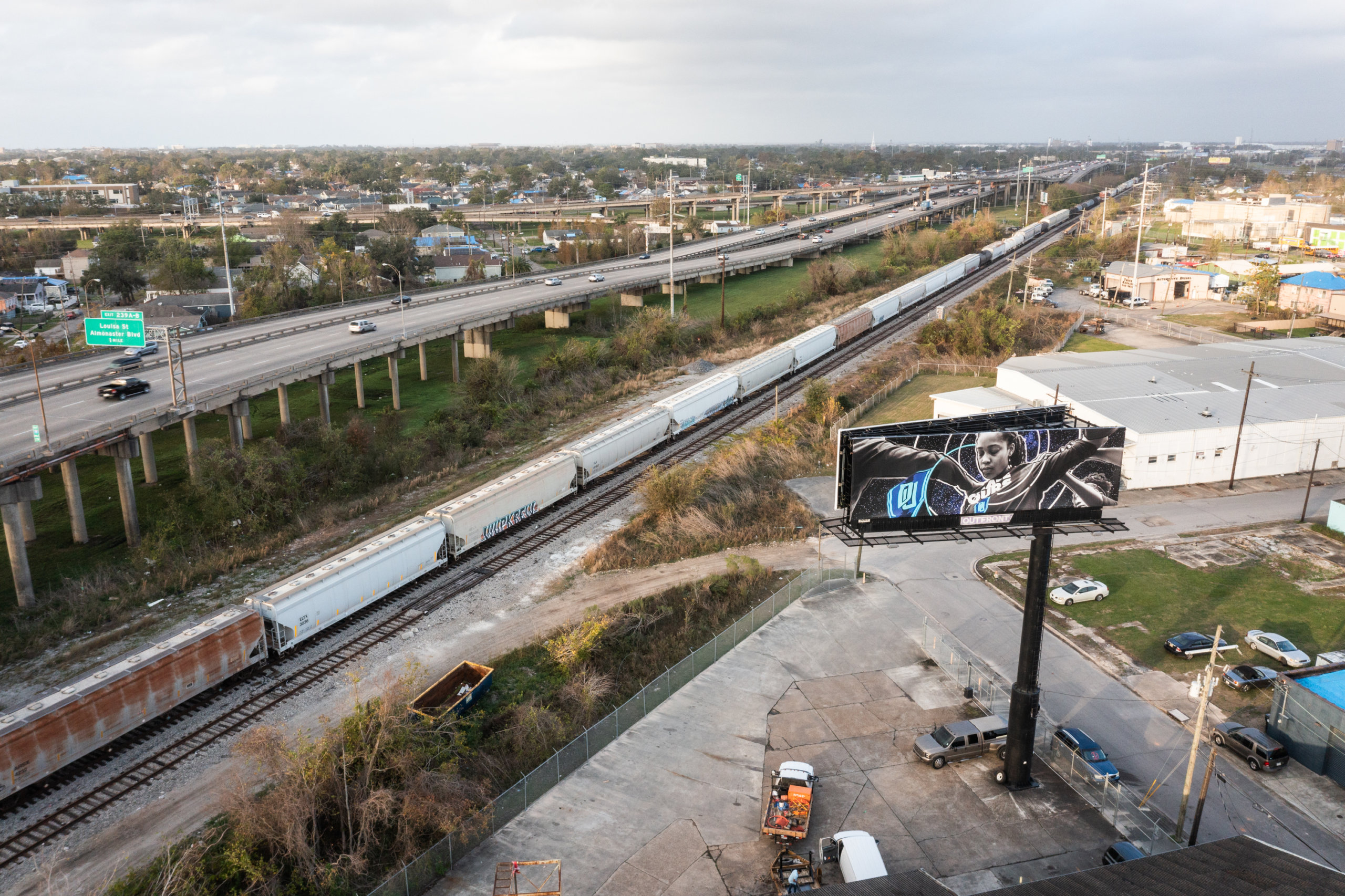 Aerial view of a "Lady Blue Devils" over Interstate 610 in New Orleans