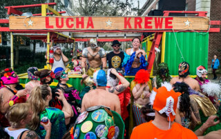 Lucha Krewe gathers for announcements and instructions before the Druids parade