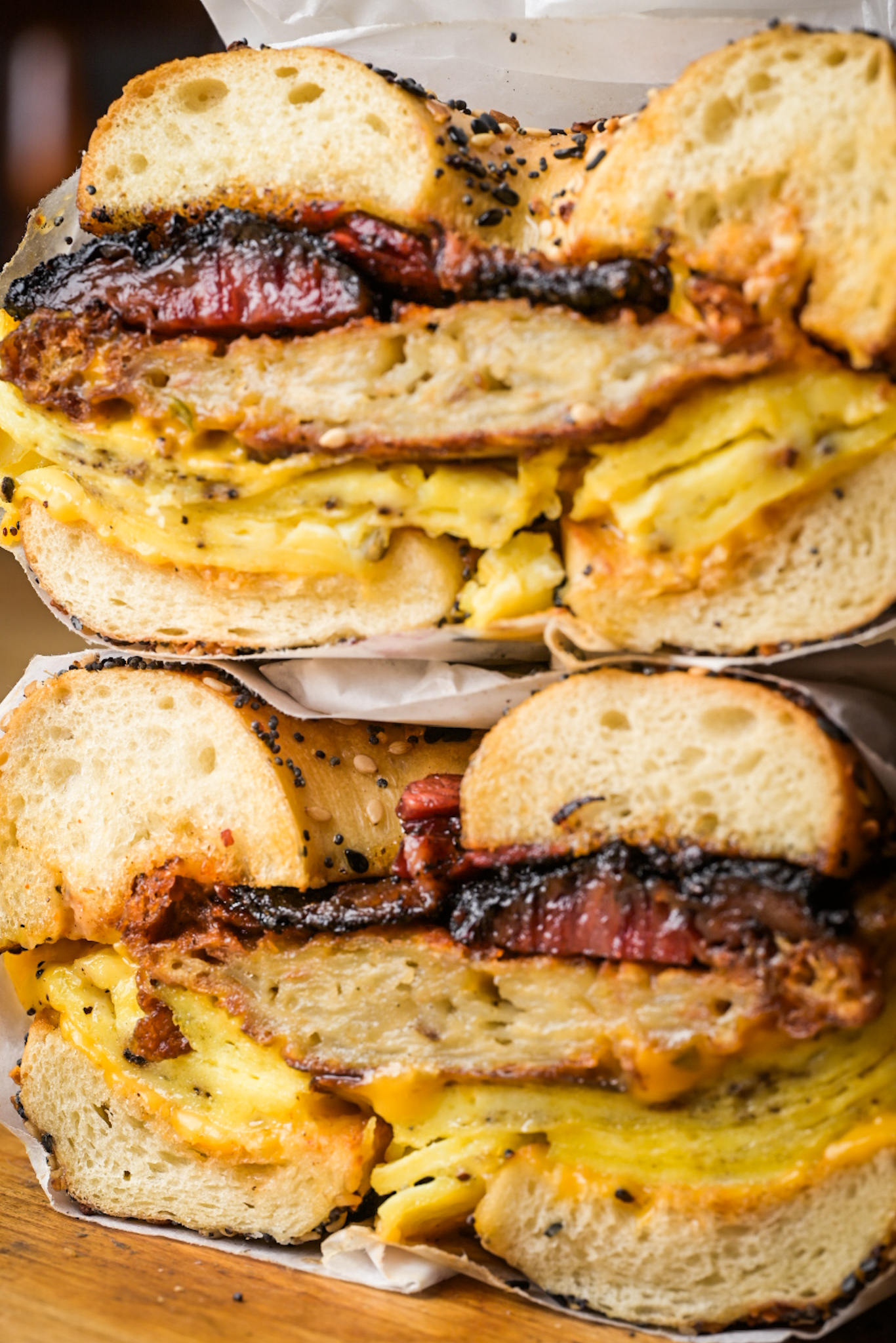 A double stack of Flour Moon's everything bagel filled with egg, latke, and smoked pastrami