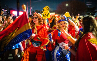 Members of the Krewe of Wonderwomen march through the streets of New Orleans