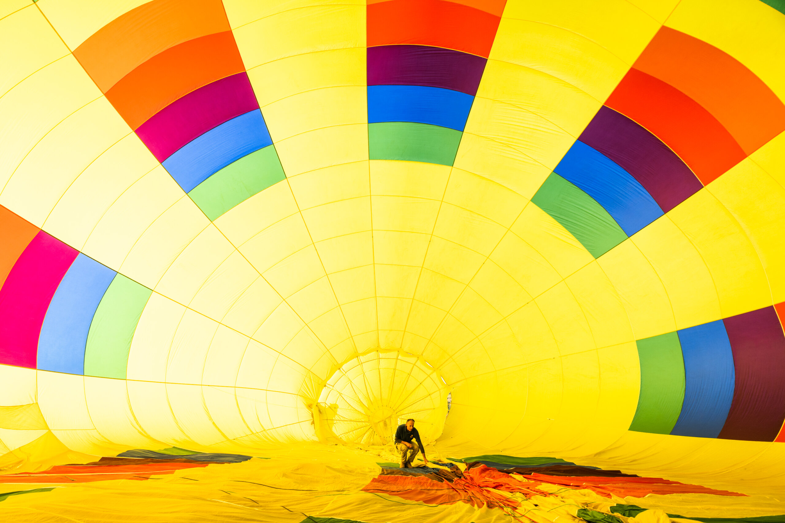 A balloon pilot from Grape Escape in Temecula inflates a hot air balloon