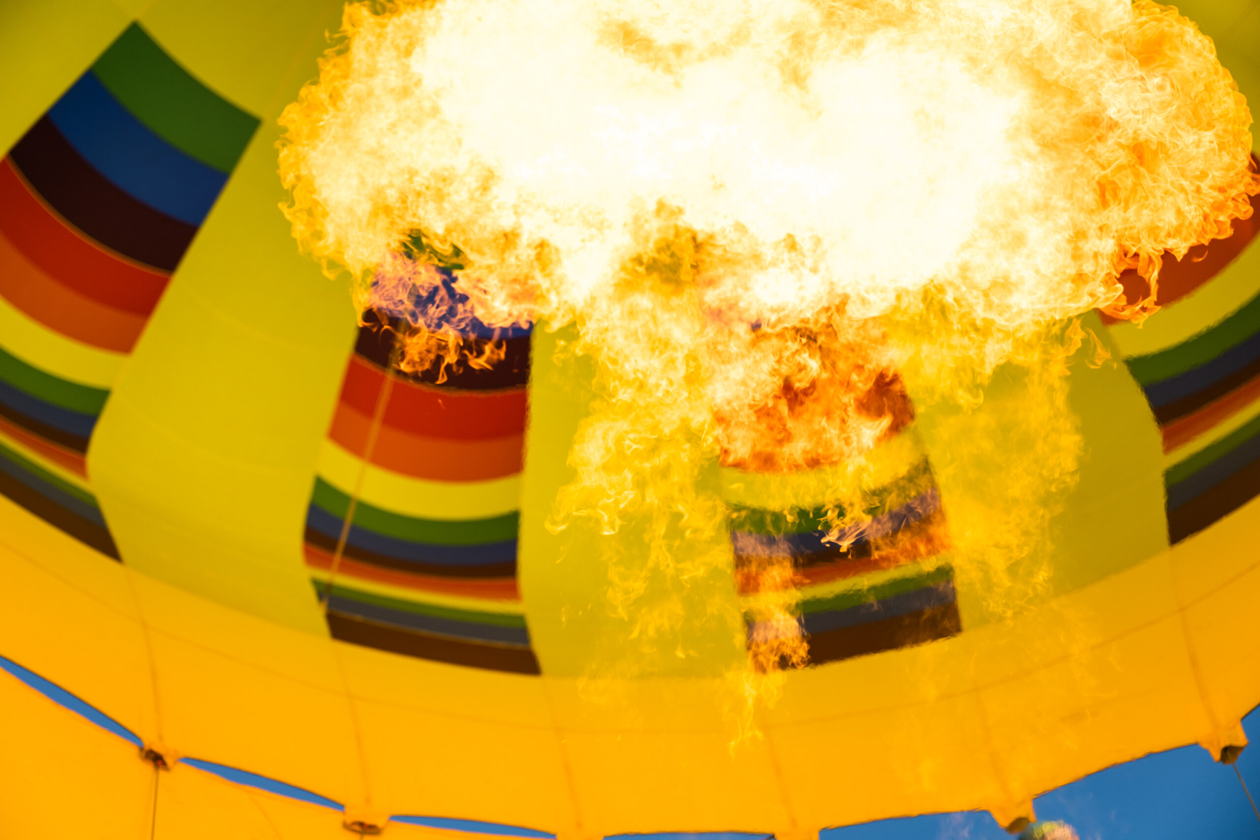 Fuel from the burners ignites to stabilize the hot air balloon's altitude