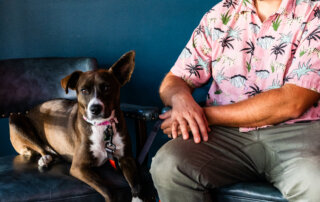 Alex of Paw Paw's Donuts and his dog Libby