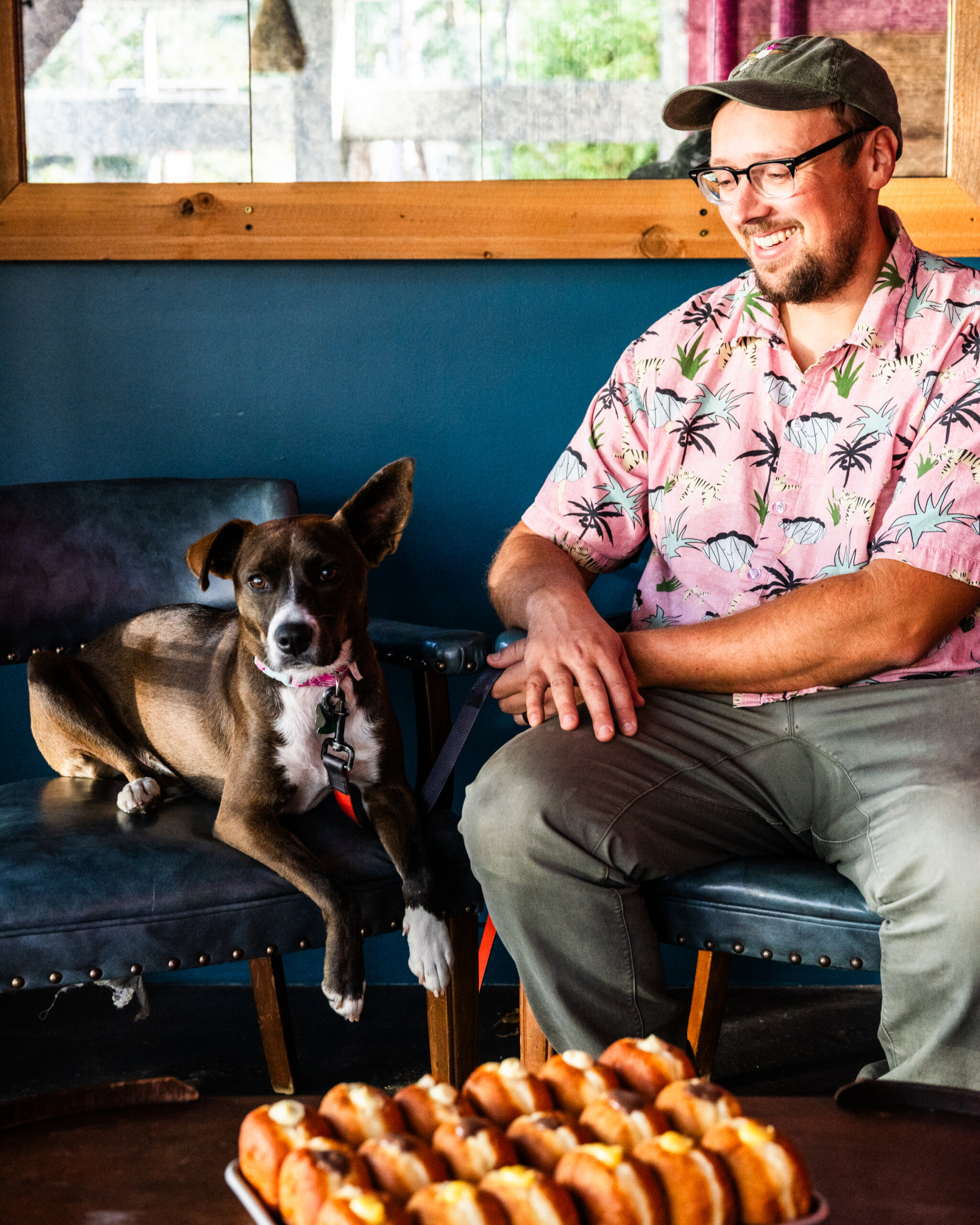 Alex of Paw Paw's Donuts and his dog Libby