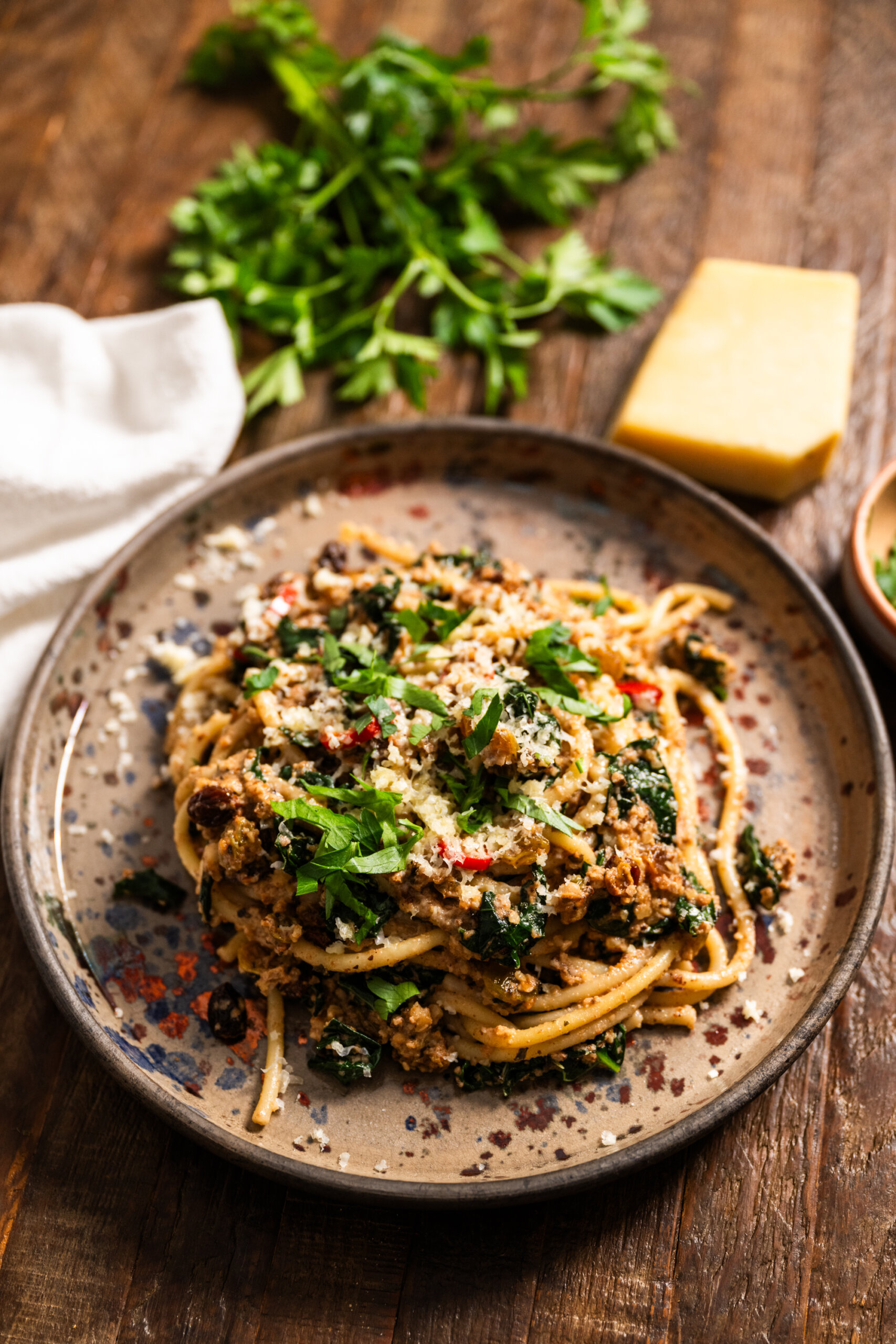 Pasta foriana - toasted walnuts, pine nuts, garlic, raisins, and kale in olive oil
