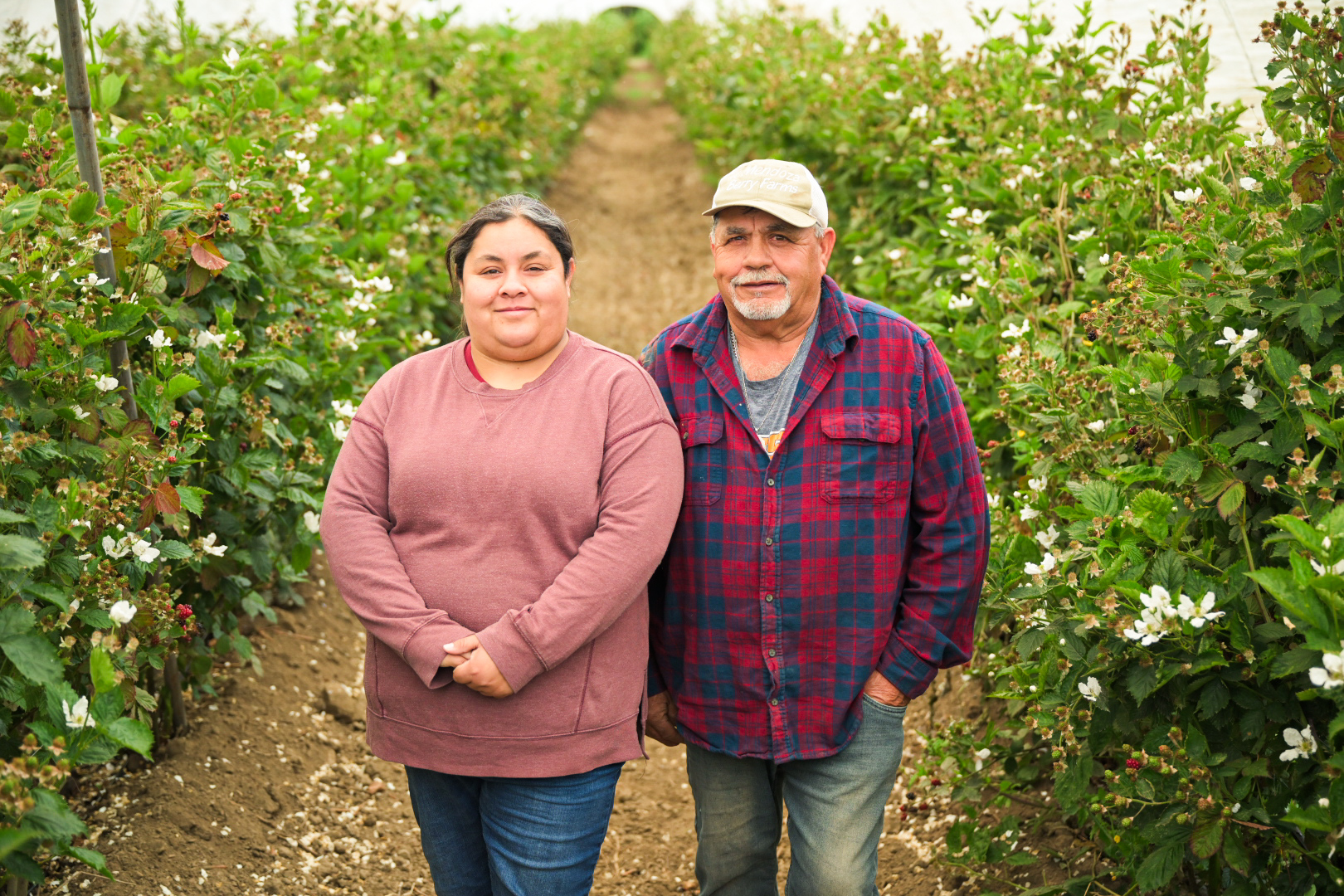 Vanessa & Emliano Mendoza in their berry field