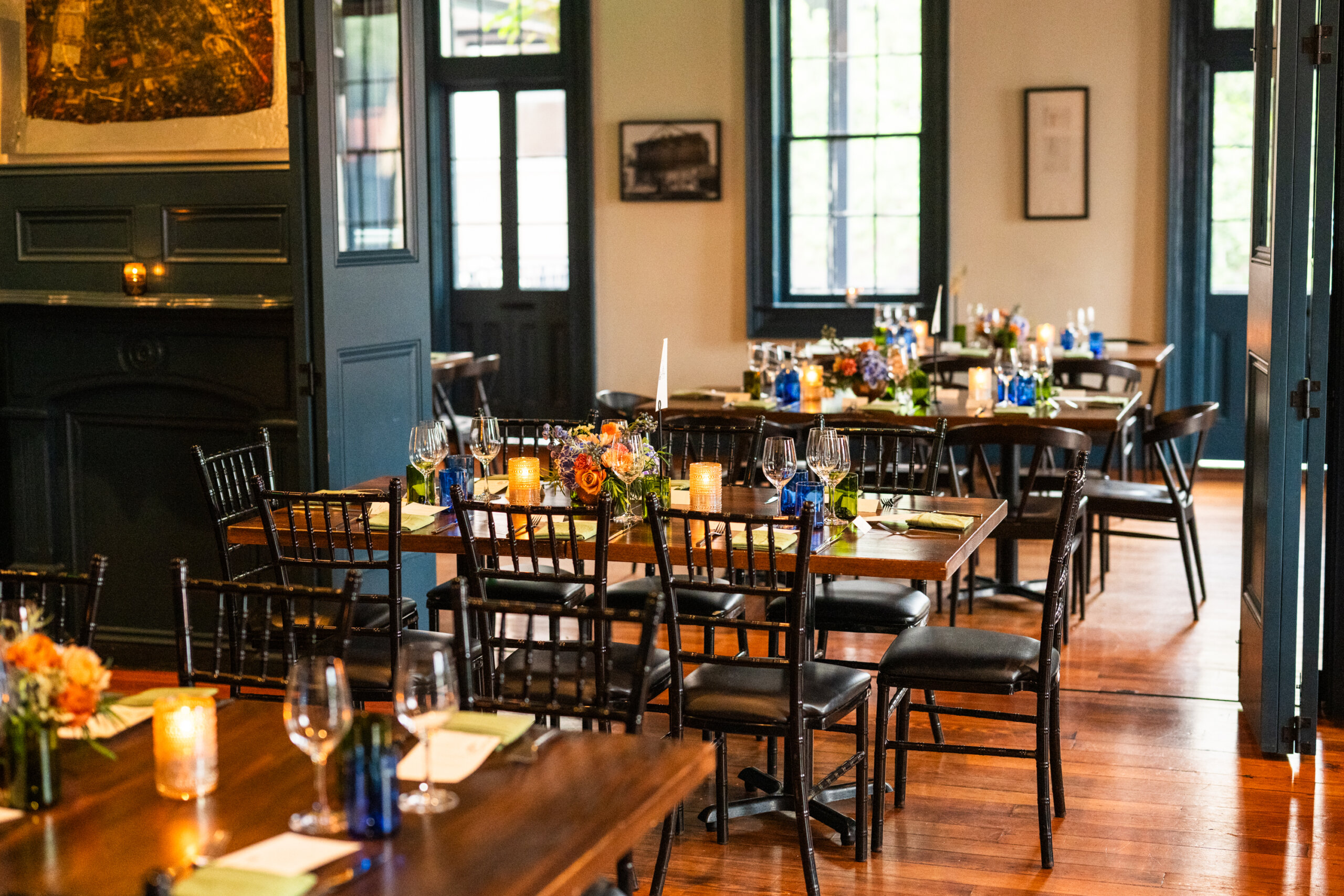 Wide image showing the table settings at a private wine dinner