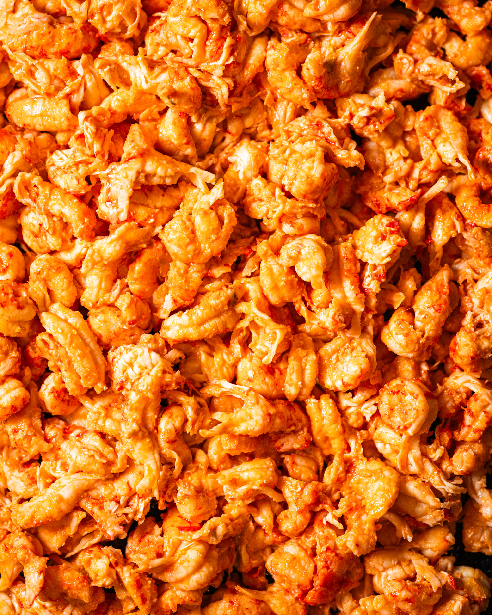 Close-up of a pile of peeled crawfish tails from Louisiana