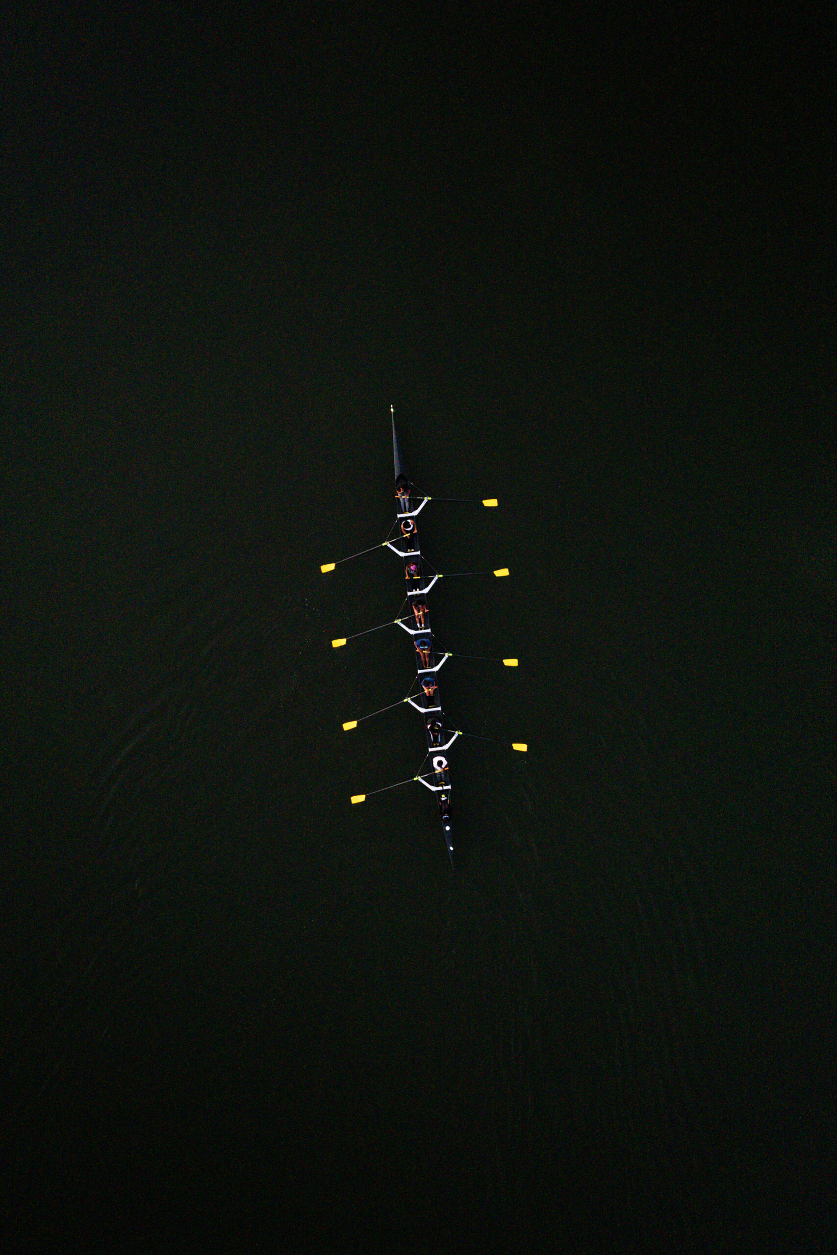 Overhead aerial image showing Xavier's 8-person rowing crew