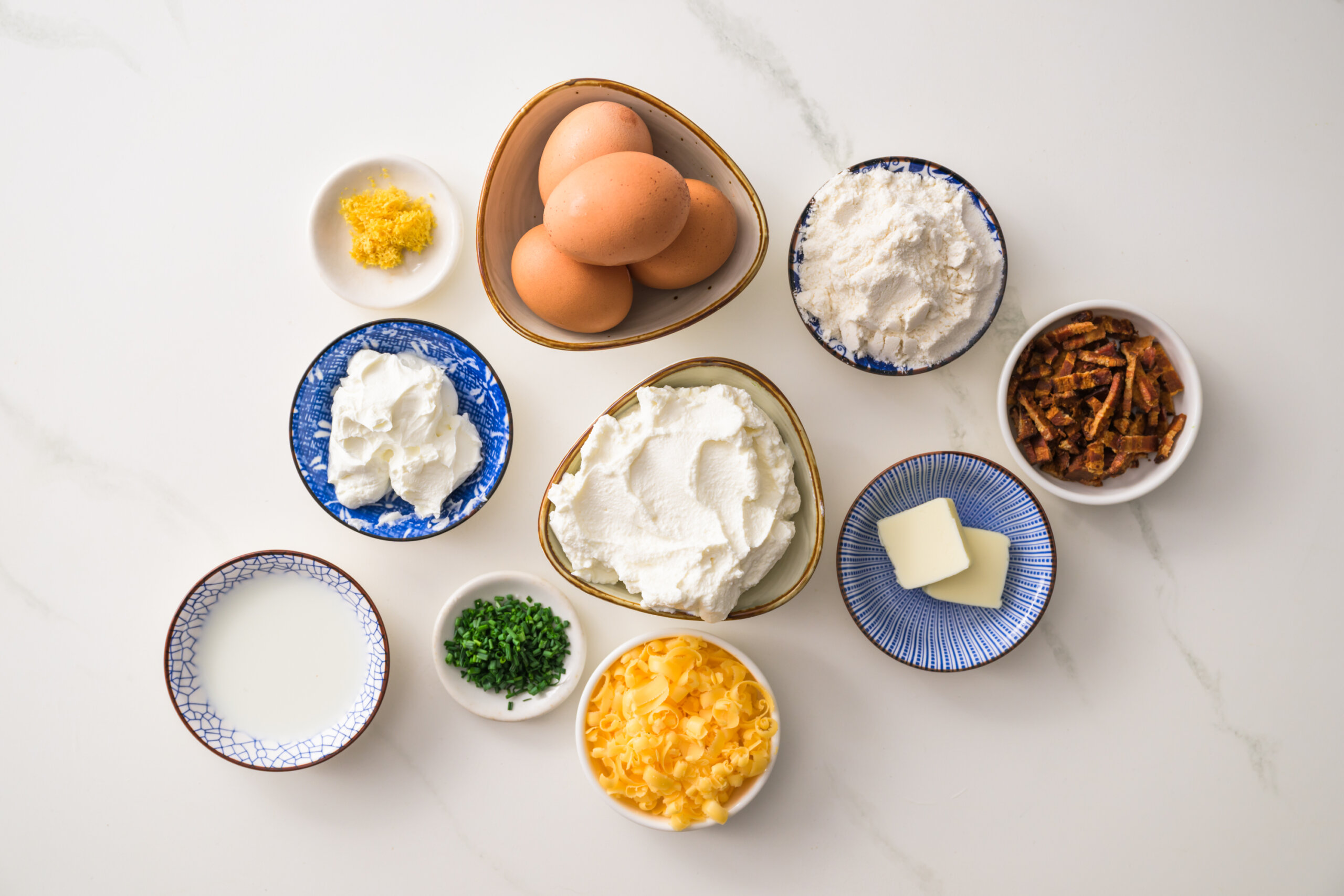 Ingredients for keto pancakes with ricotta, lebneh, and cheddar