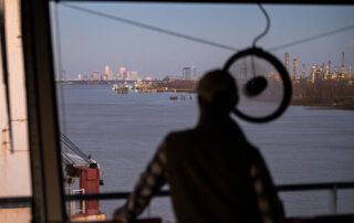 Looking up river at New Orleans from the bridge of the DEMA